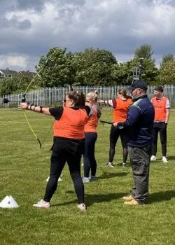 team playing archery