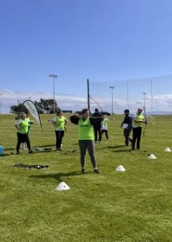 team practicing archery