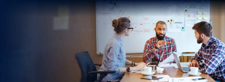 discussing processes in boardroom